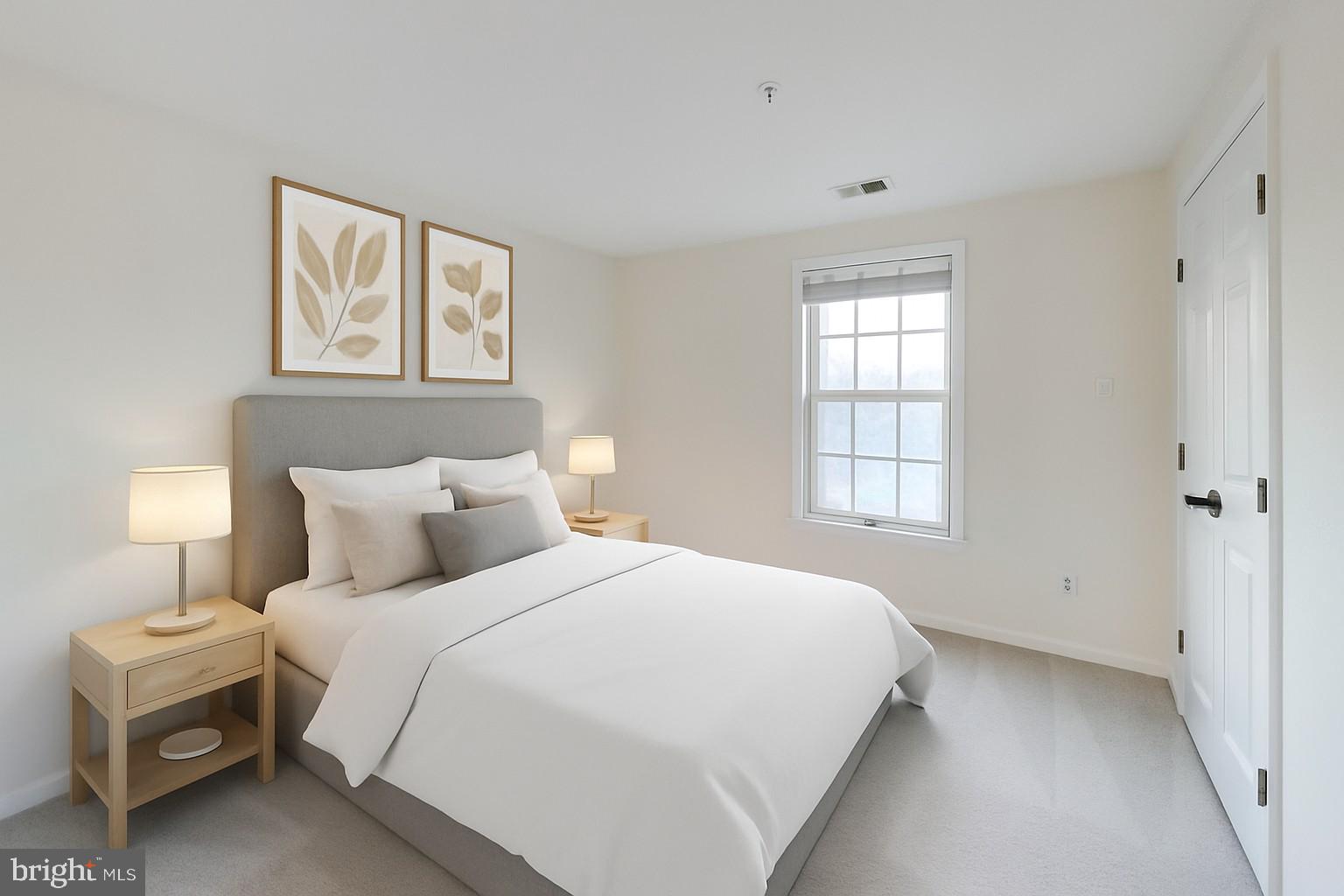 13107 Briarcliff Terrace, Unit 2204 Germantown, MD 20874 - Photo 21 of 30 a bedroom with a bed and a window