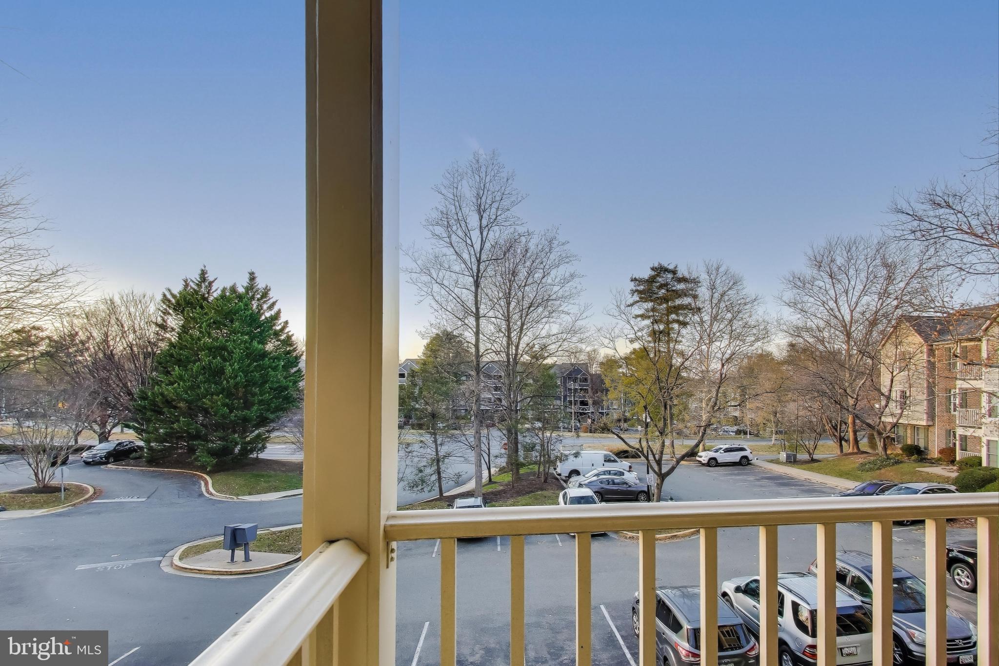 13107 Briarcliff Terrace, Unit 2204 Germantown, MD 20874 - Photo 28 of 30 a view of a balcony with lake view and trees