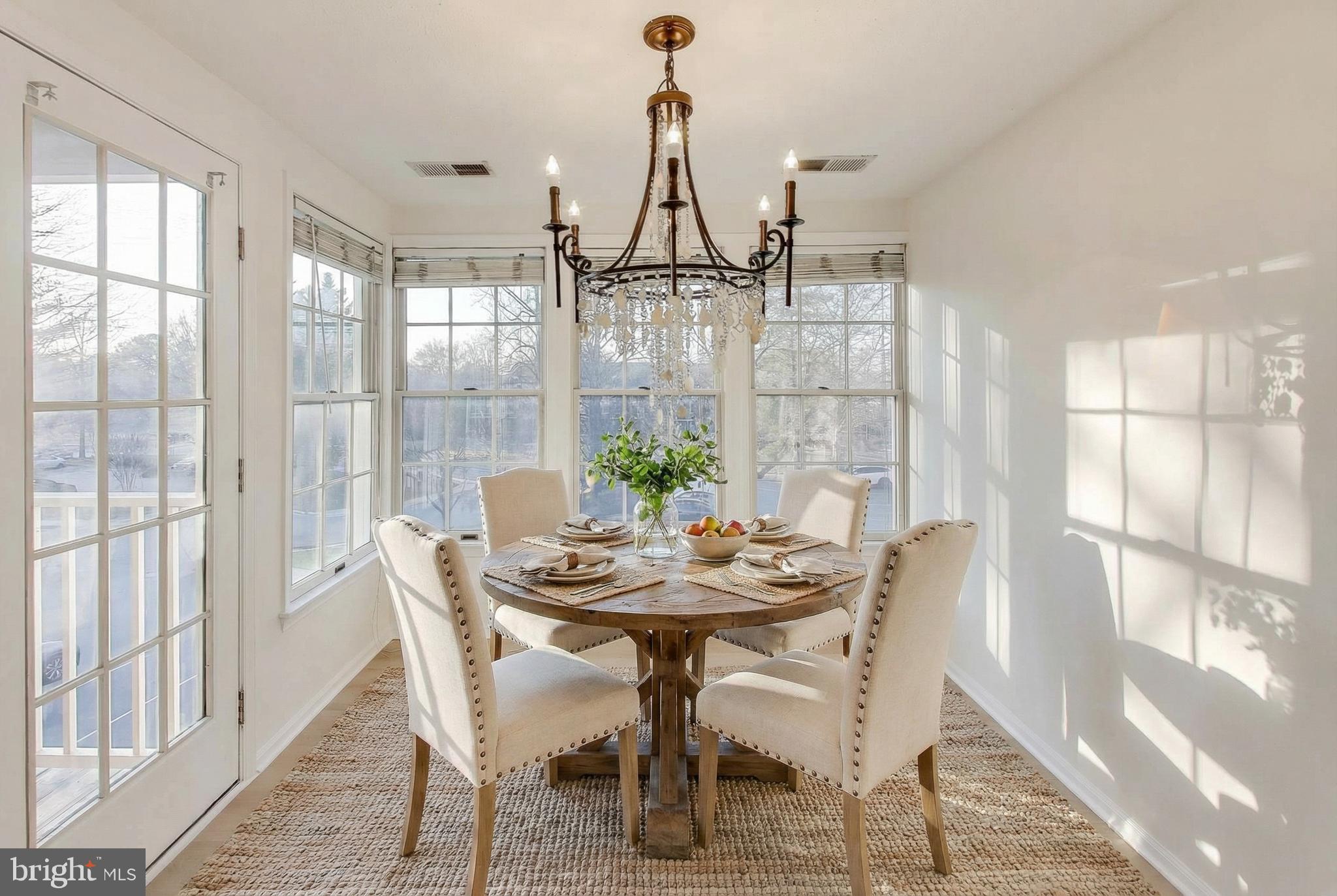 13107 Briarcliff Terrace, Unit 2204 Germantown, MD 20874 - Photo 10 of 30 a view of a dining room with furniture window and outside view