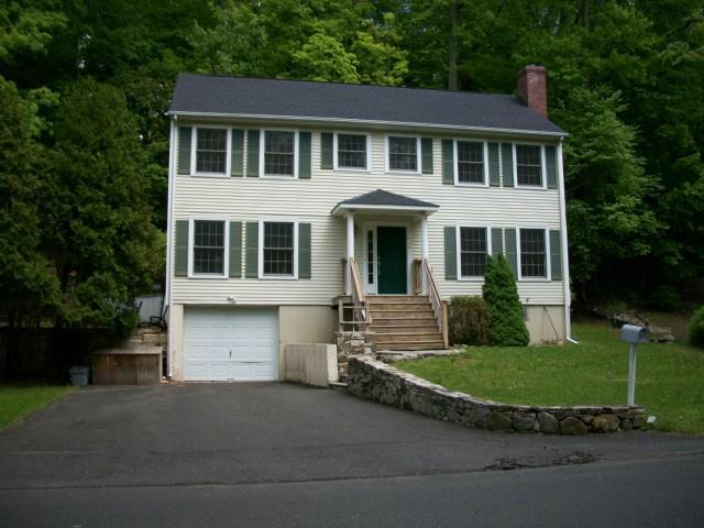 440 Limestone Road Ridgefield, CT 06877 - Photo 1 of 1 front view of a house with a yard