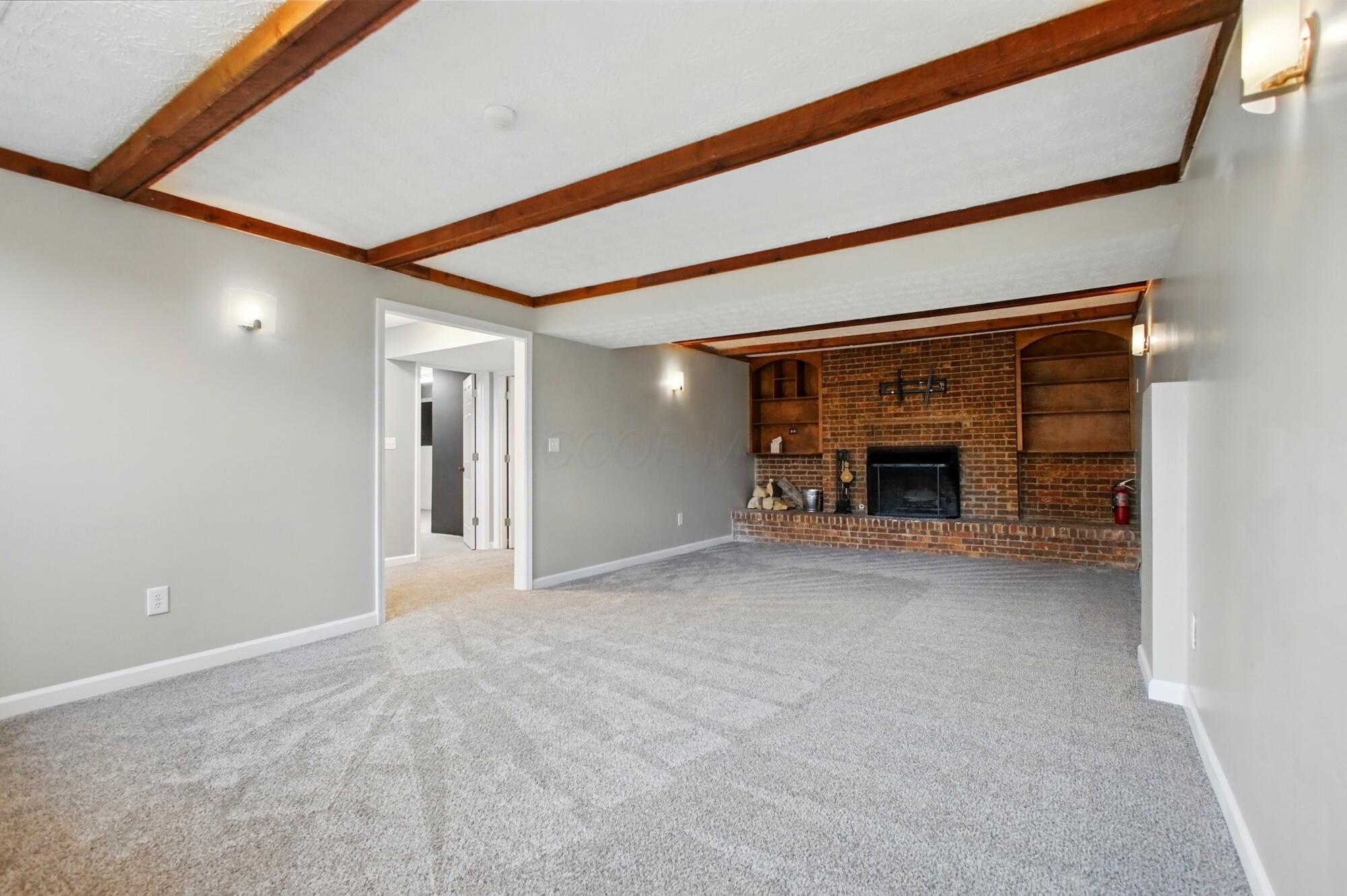 834 Doherty Road Columbus, OH 43228 - Photo 38 of 55 Lower Level Living Room