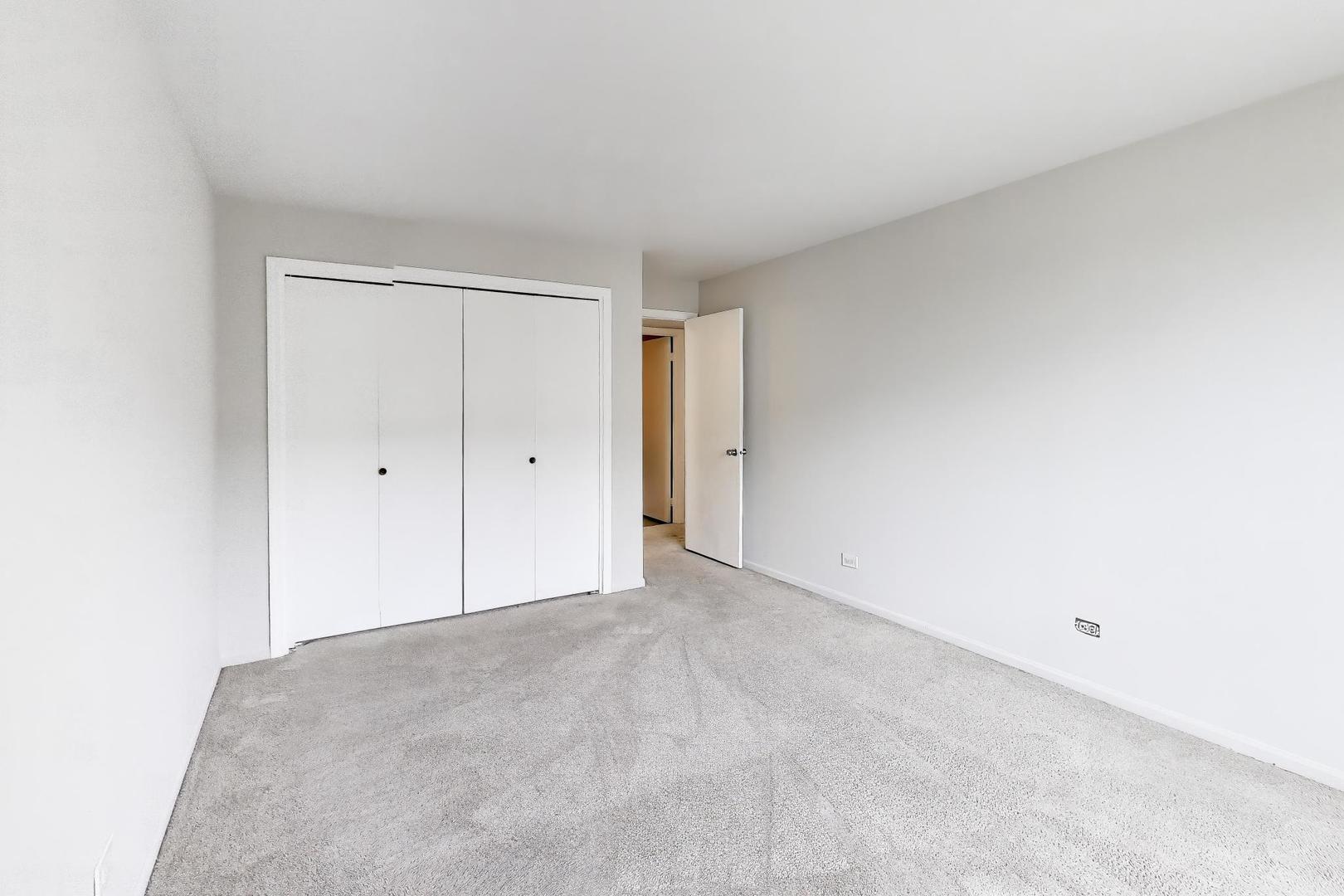 8610 Waukegan Road, Unit 302 Morton Grove, IL 60053 - Photo 26 of 34 a view of an empty room