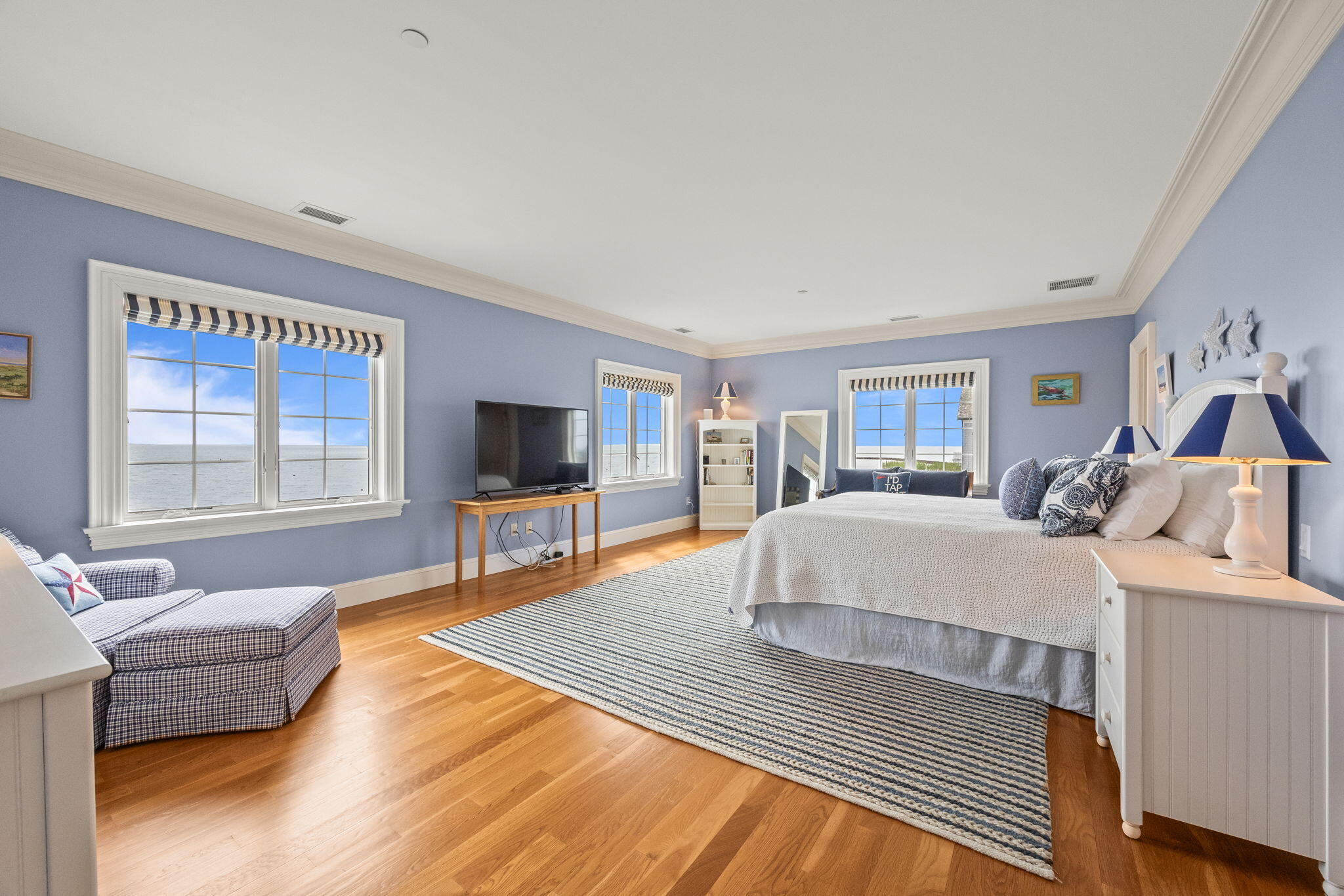 23 Snow Inn Road, Unit 8 Harwich Port, MA 02646 - Photo 30 of 100 a spacious bedroom with a large bed and a flat screen tv