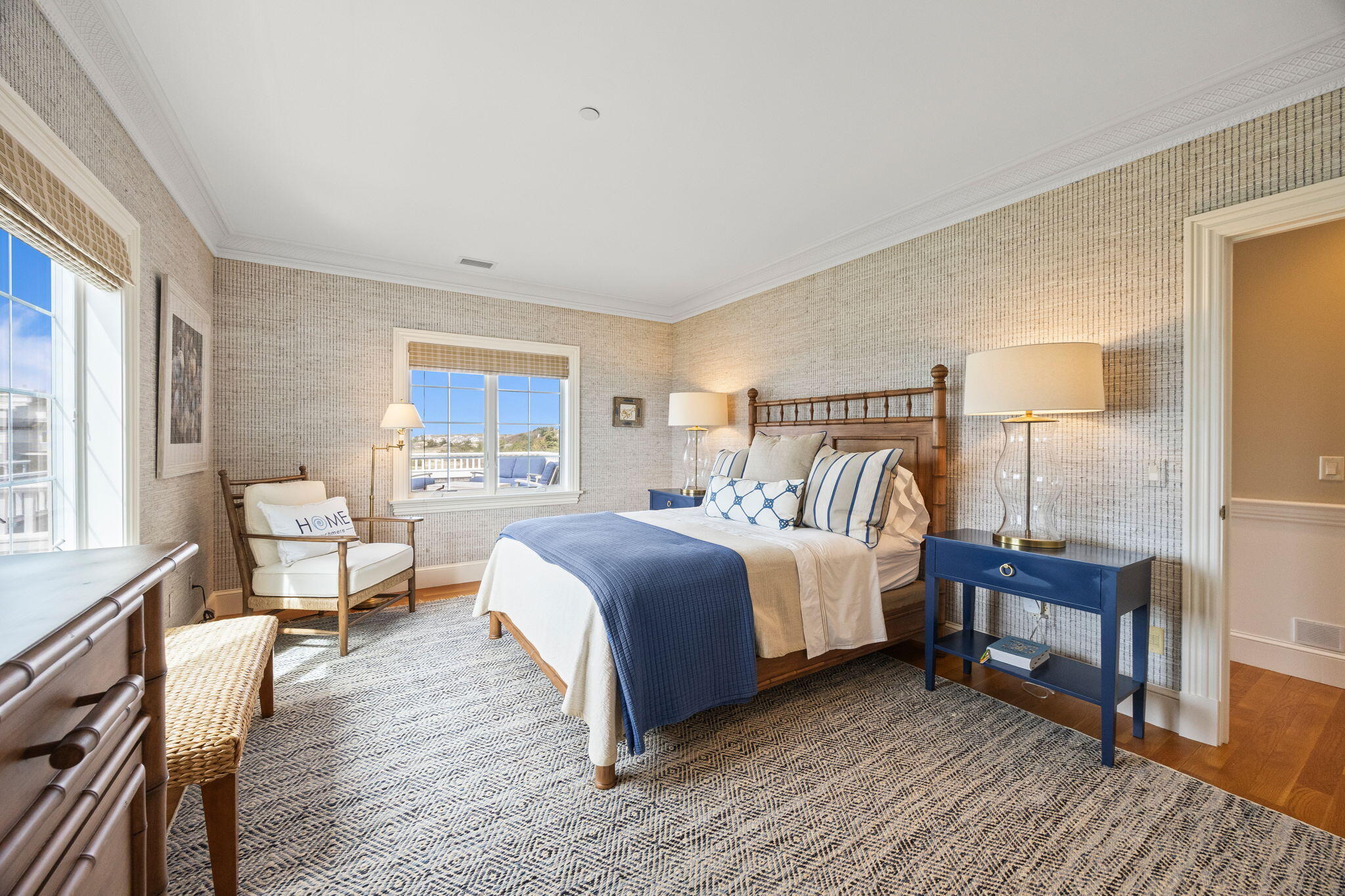 23 Snow Inn Road, Unit 8 Harwich Port, MA 02646 - Photo 38 of 100 a bedroom with a bed and wooden floor