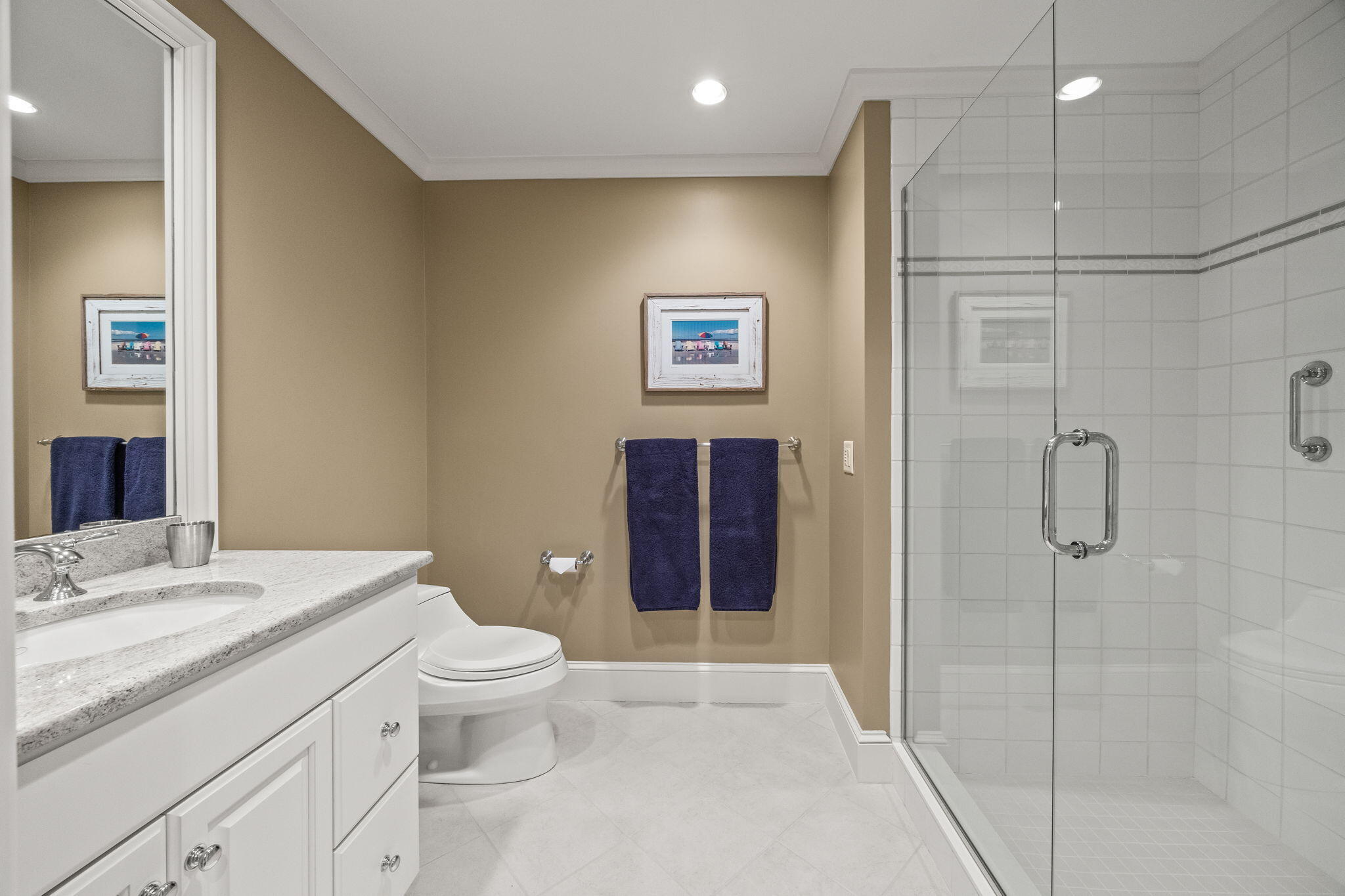 23 Snow Inn Road, Unit 8 Harwich Port, MA 02646 - Photo 50 of 100 a spacious bathroom with a granite countertop sink a toilet and a shower