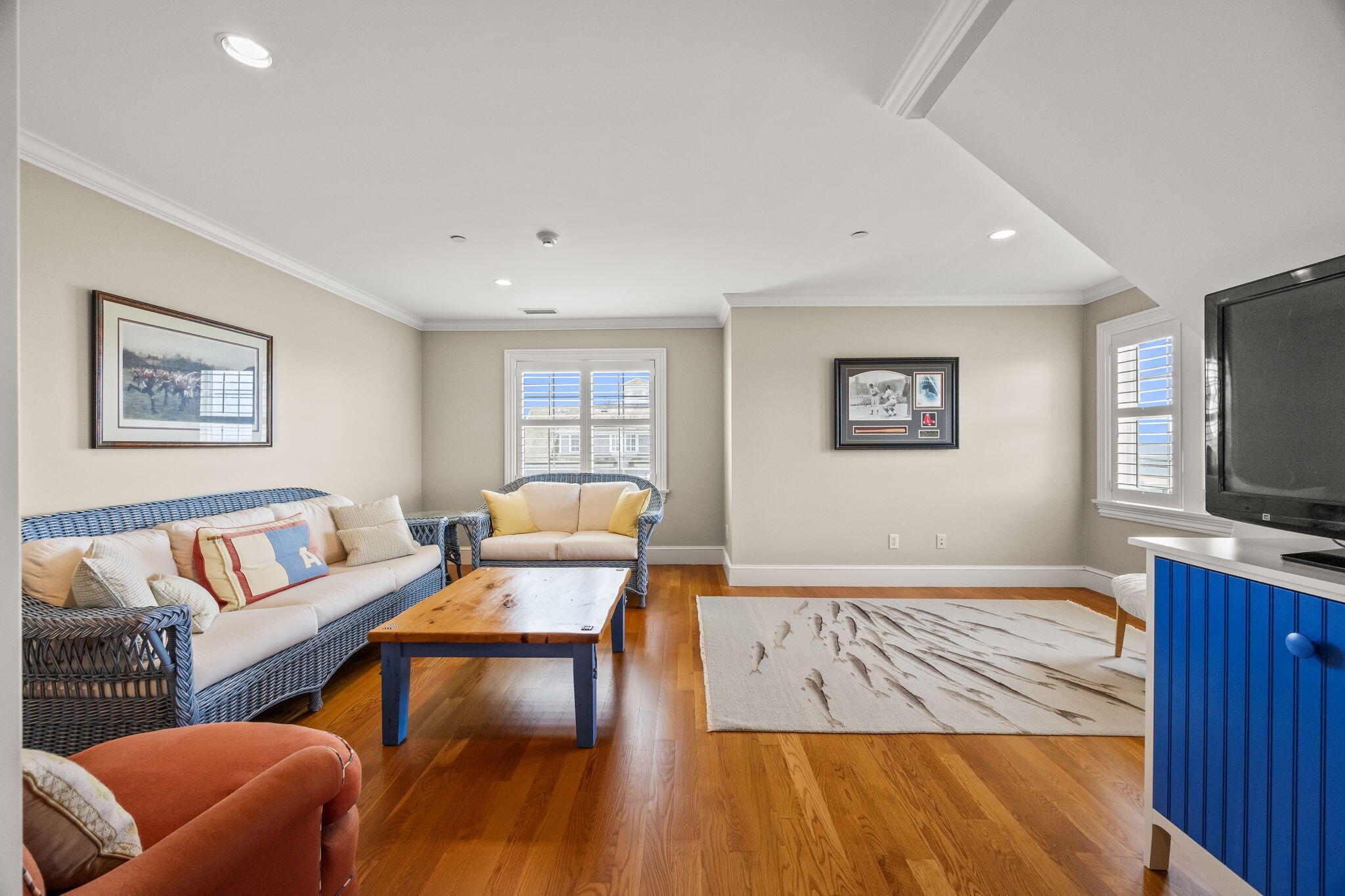 23 Snow Inn Road, Unit 8 Harwich Port, MA 02646 - Photo 54 of 100 a living room with furniture and a flat screen tv