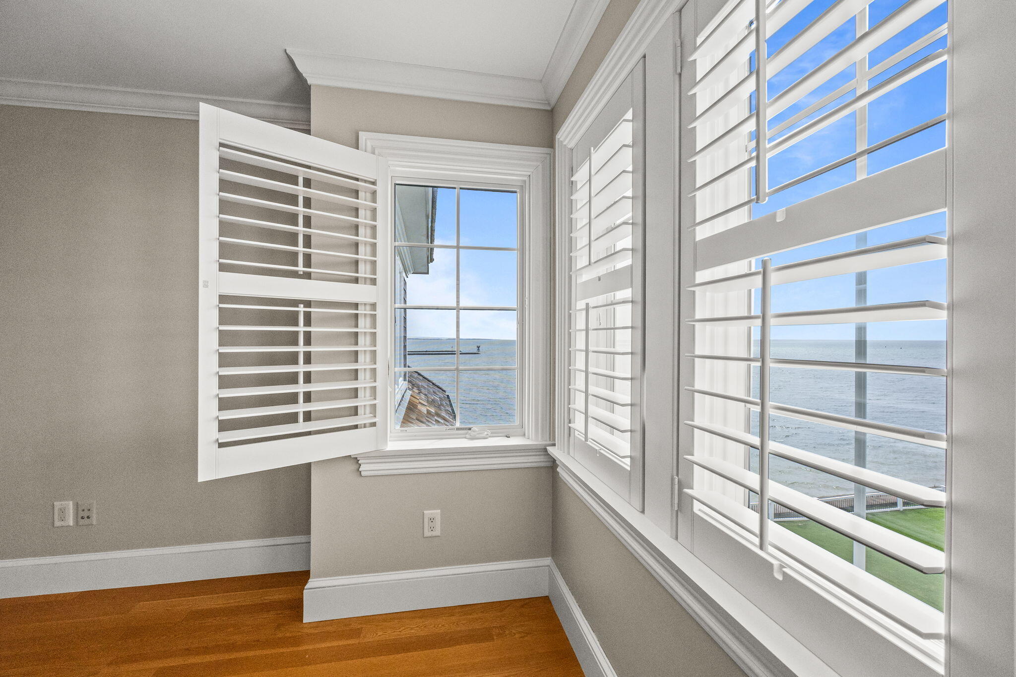 23 Snow Inn Road, Unit 8 Harwich Port, MA 02646 - Photo 59 of 100 a view of a room that has a window and wooden floor