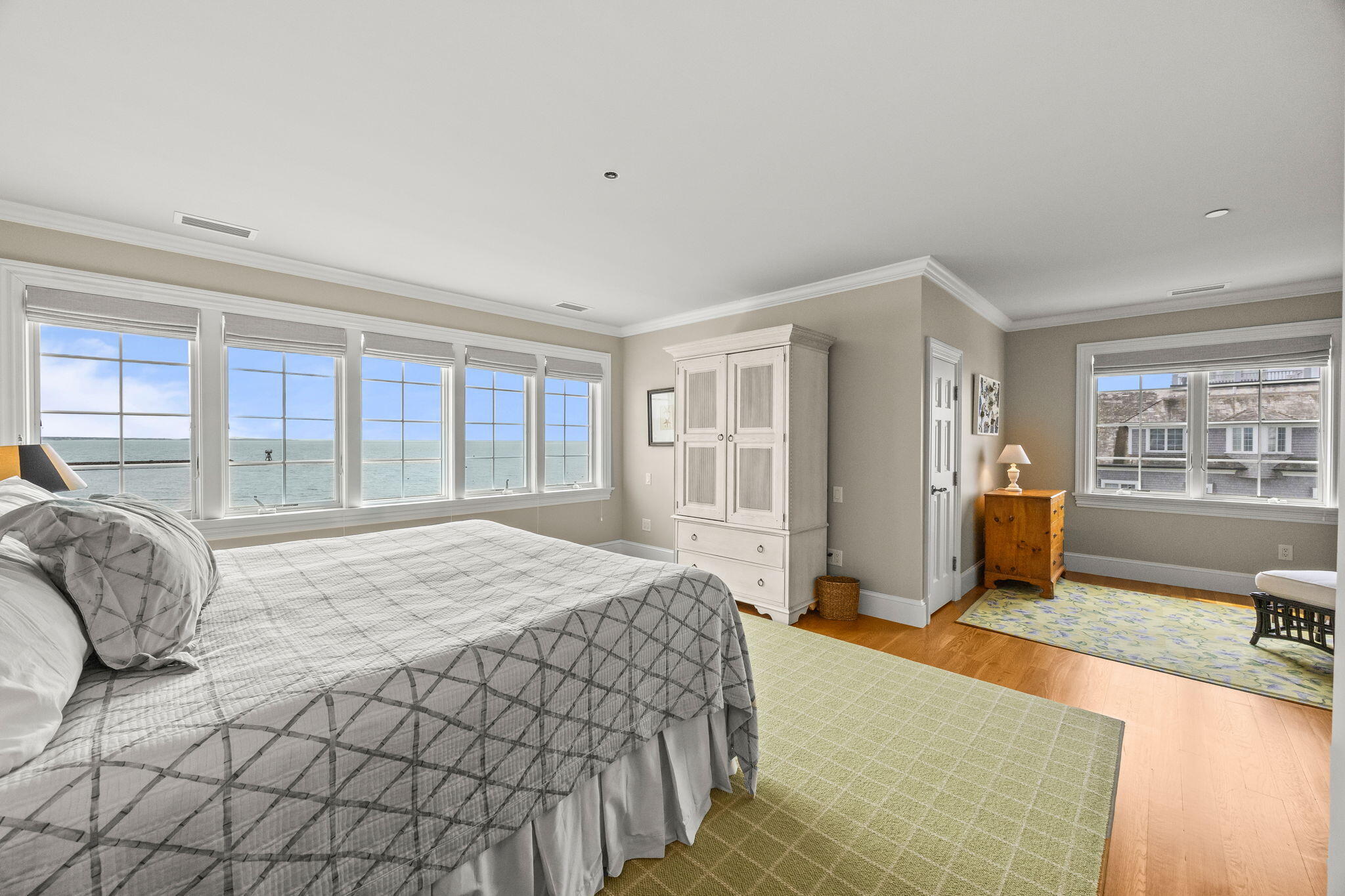 23 Snow Inn Road, Unit 8 Harwich Port, MA 02646 - Photo 63 of 100 a bedroom with a large bed and a large window