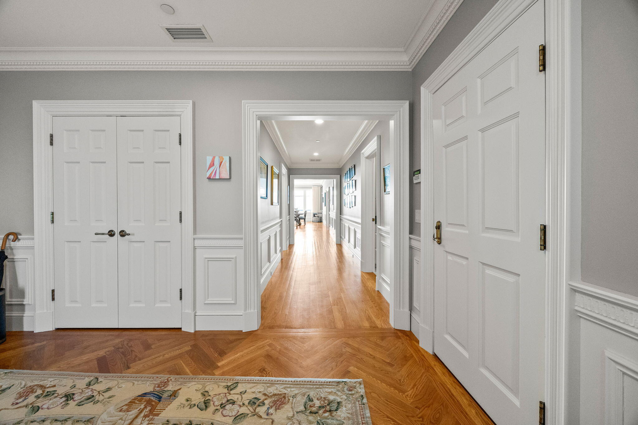 23 Snow Inn Road, Unit 8 Harwich Port, MA 02646 - Photo 9 of 100 a view of a hallway with wooden floor and staircase