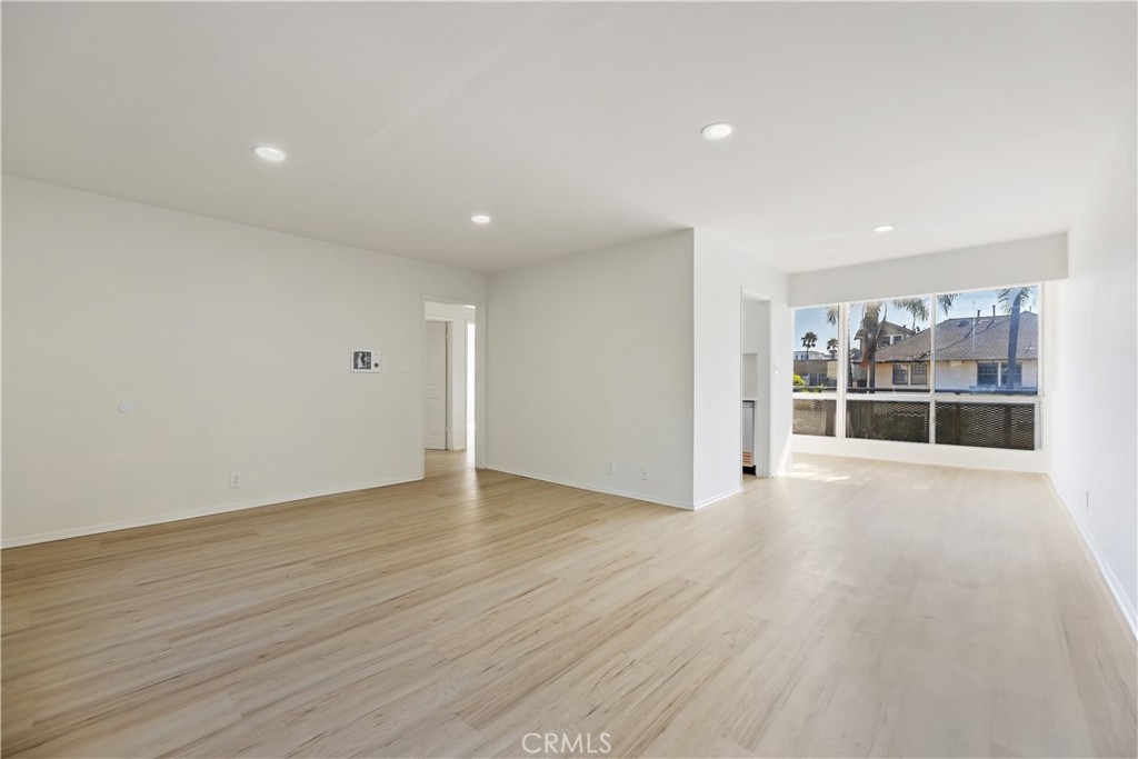 505 Cedar Avenue, Unit 2A Long Beach, CA 90802 - Photo 2 of 71 wooden floor in an empty room with a window
