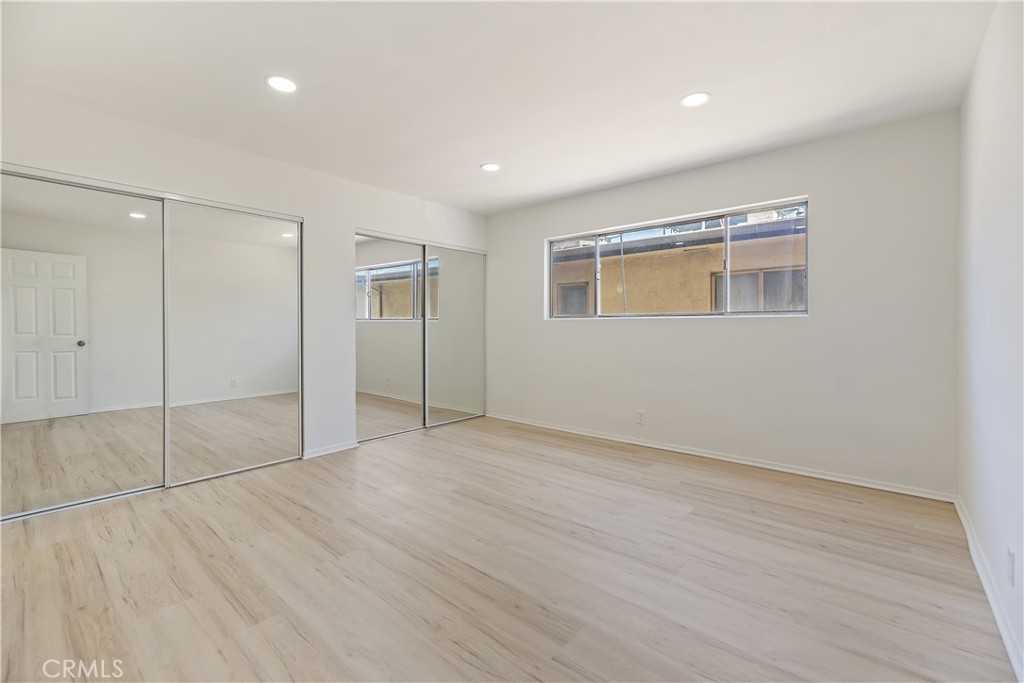 505 Cedar Avenue, Unit 2A Long Beach, CA 90802 - Photo 30 of 71 wooden floor in an empty room with a window