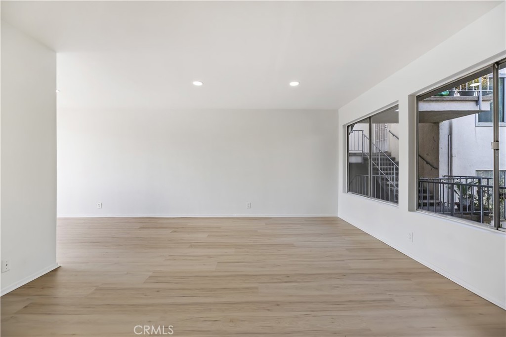 505 Cedar Avenue, Unit 2A Long Beach, CA 90802 - Photo 3 of 71 a view of an empty room with wooden floor