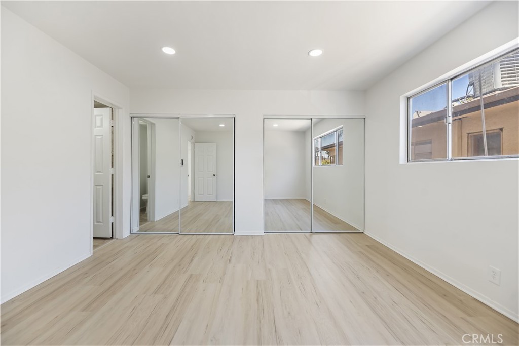 505 Cedar Avenue, Unit 2A Long Beach, CA 90802 - Photo 31 of 71 a view of empty room with wooden floor