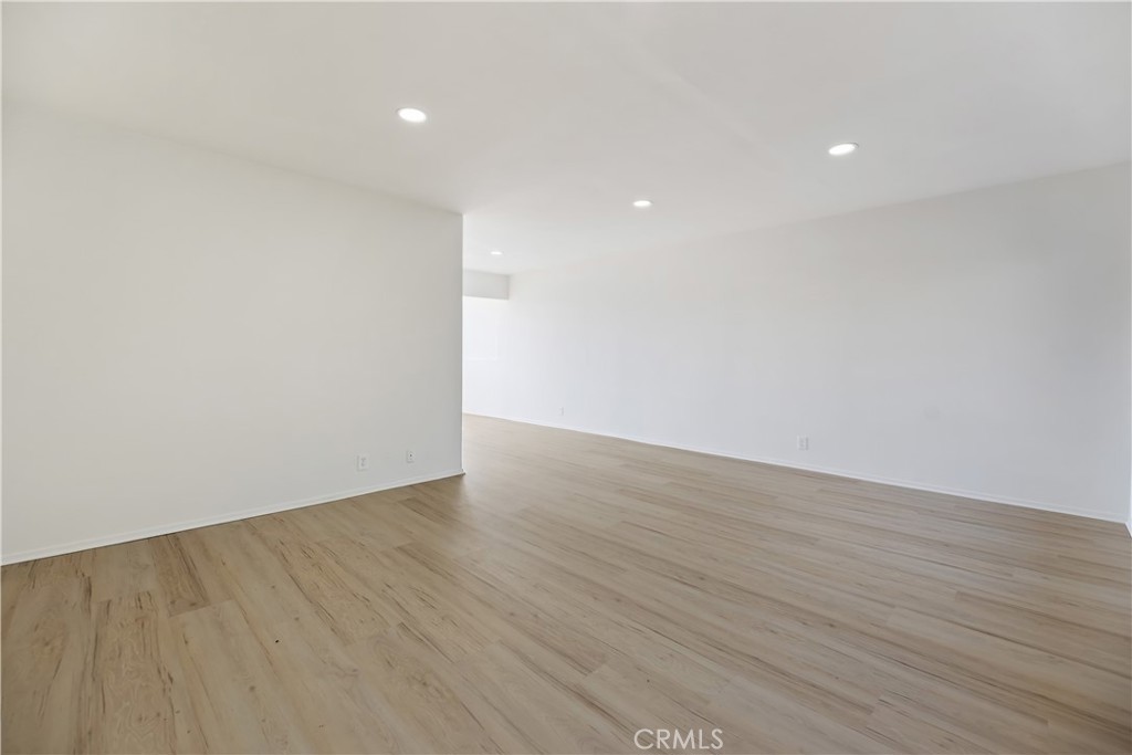 505 Cedar Avenue, Unit 2A Long Beach, CA 90802 - Photo 50 of 71 a view of an empty room with wooden floor