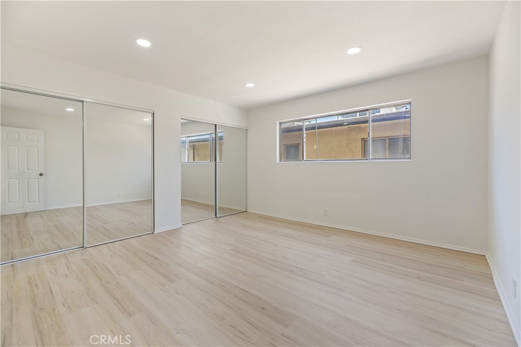 505 Cedar Avenue, Unit 2A Long Beach, CA 90802 - Photo 65 of 71 wooden floor in an empty room with a window