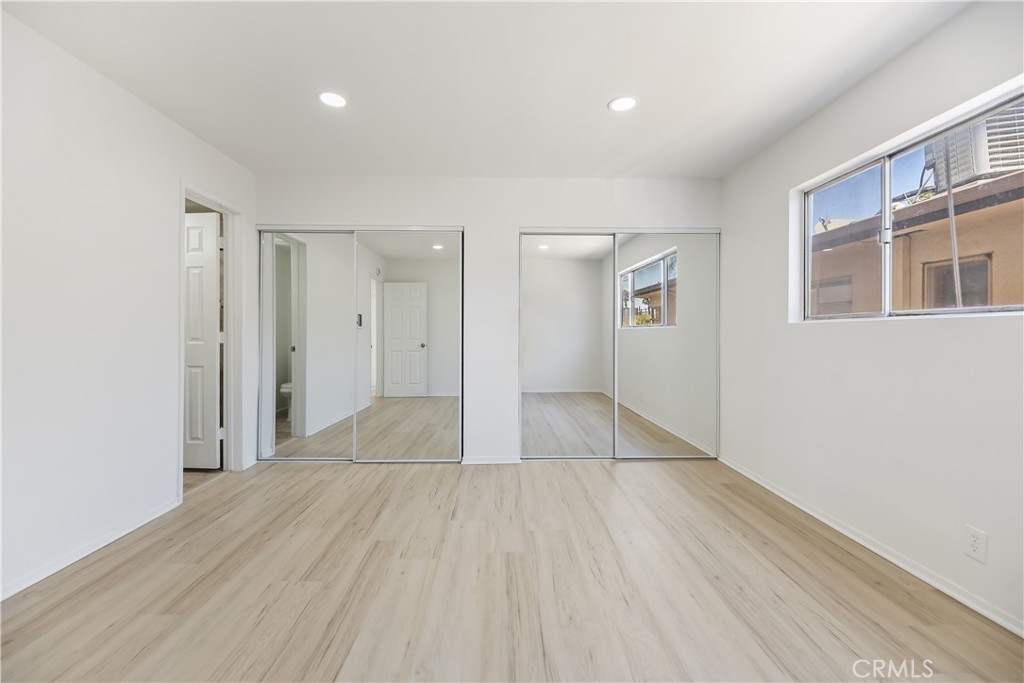 505 Cedar Avenue, Unit 2A Long Beach, CA 90802 - Photo 66 of 71 a view of empty room with wooden floor