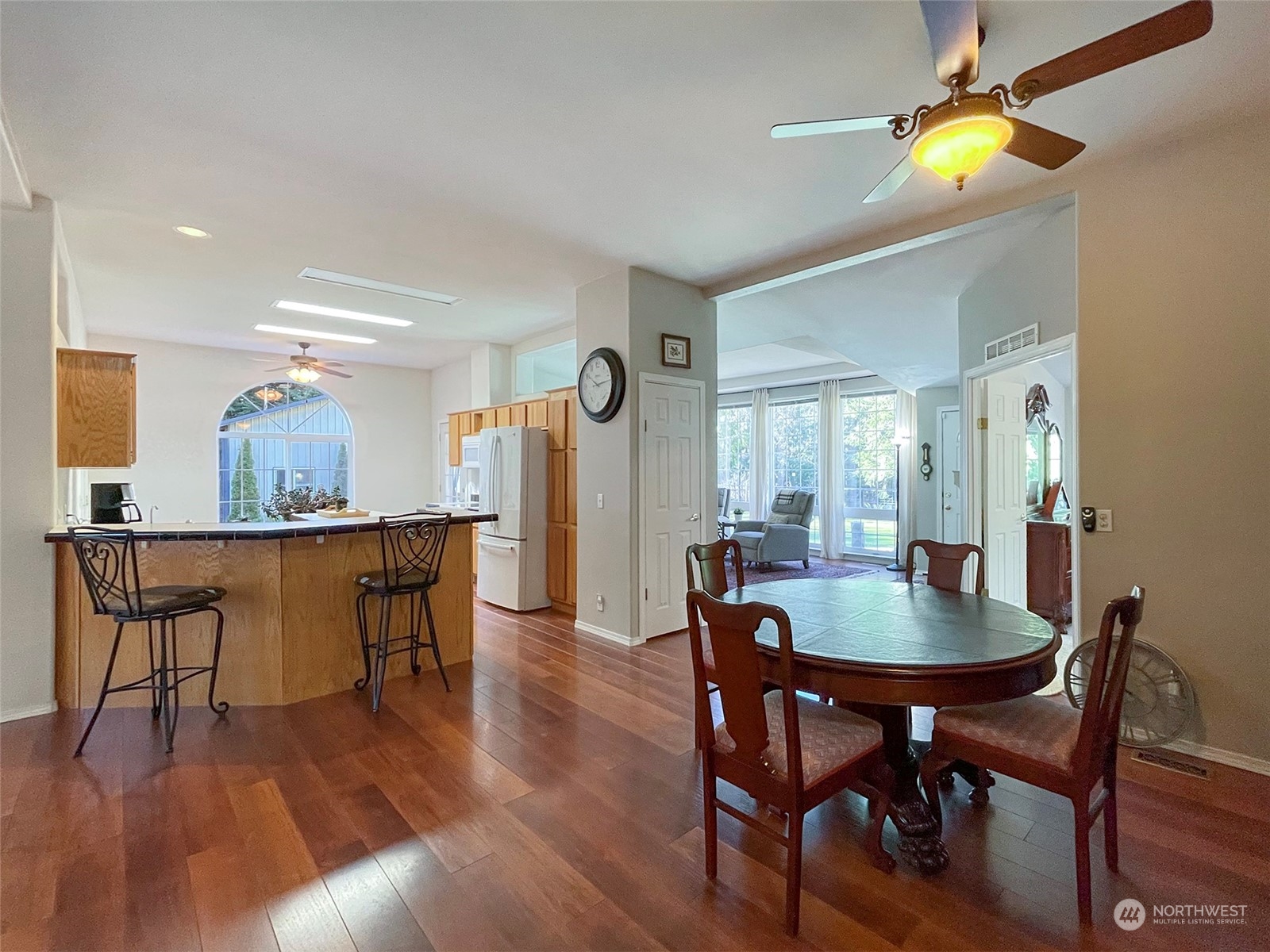 297 Amarillo Road Port Angeles, WA 98362 - Photo 15 of 40 a view of a dining room with furniture and wooden floor