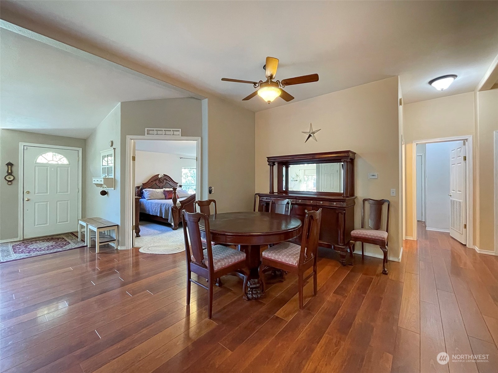 297 Amarillo Road Port Angeles, WA 98362 - Photo 18 of 40 a view of a dining room with furniture and wooden floor