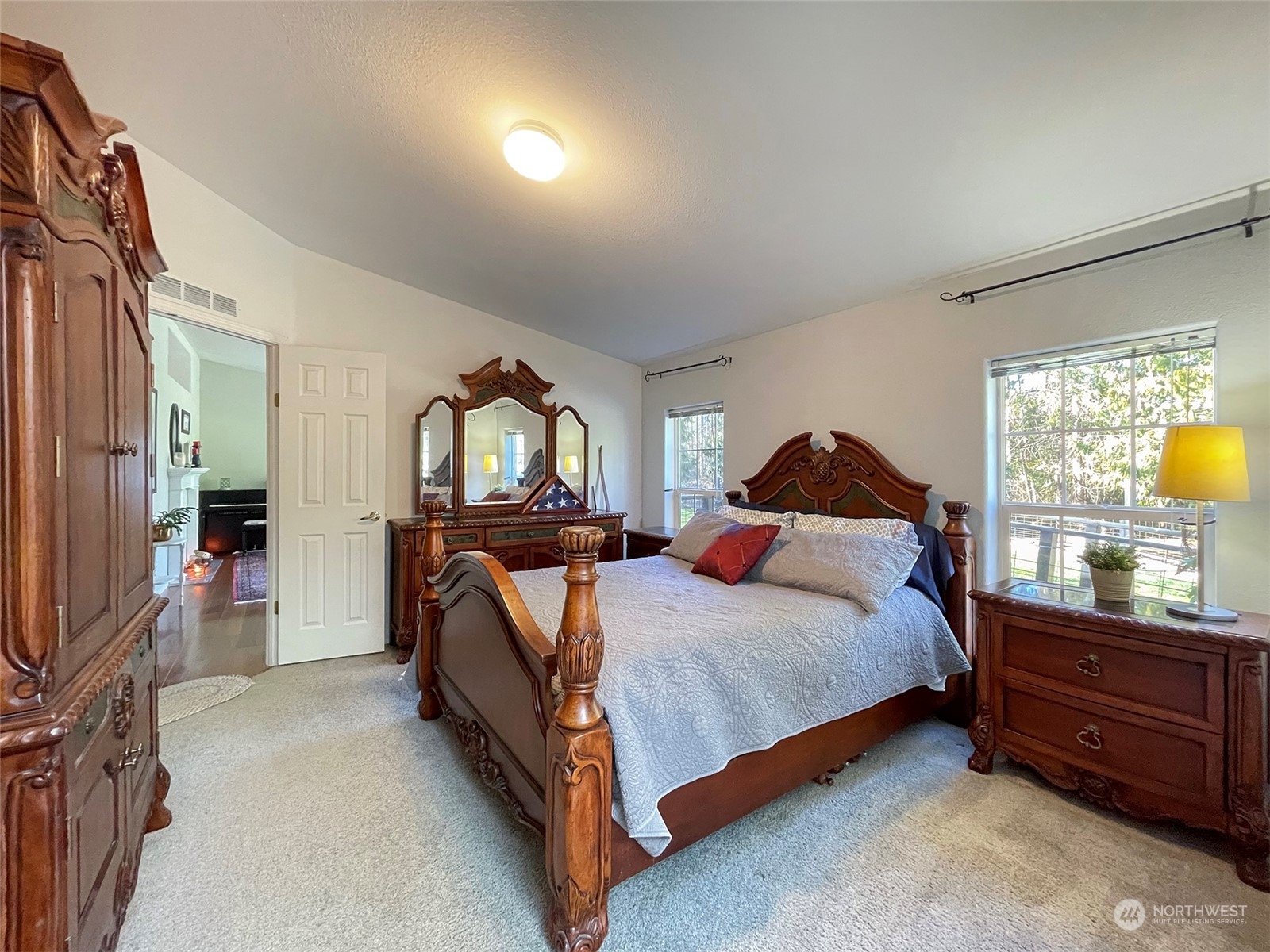 297 Amarillo Road Port Angeles, WA 98362 - Photo 23 of 40 a bedroom with a bed window tv and dresser