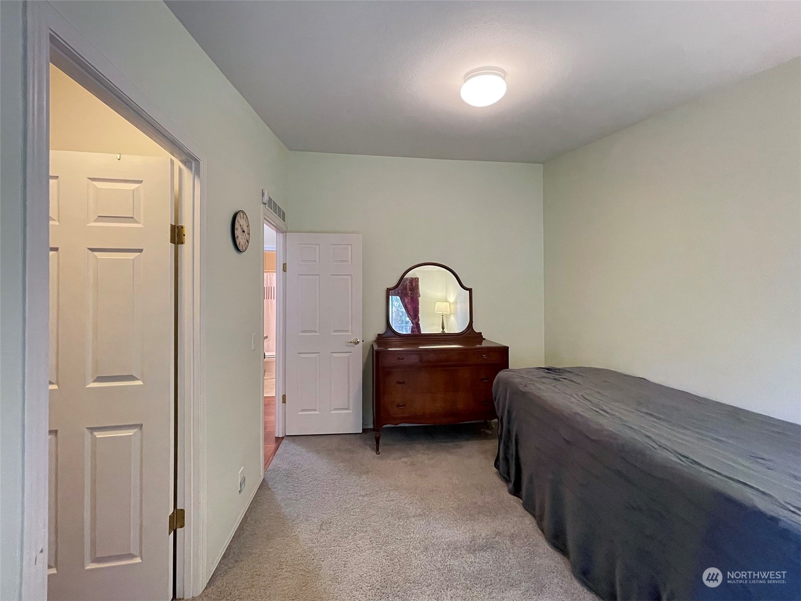 297 Amarillo Road Port Angeles, WA 98362 - Photo 25 of 40 a bedroom with bed and a window