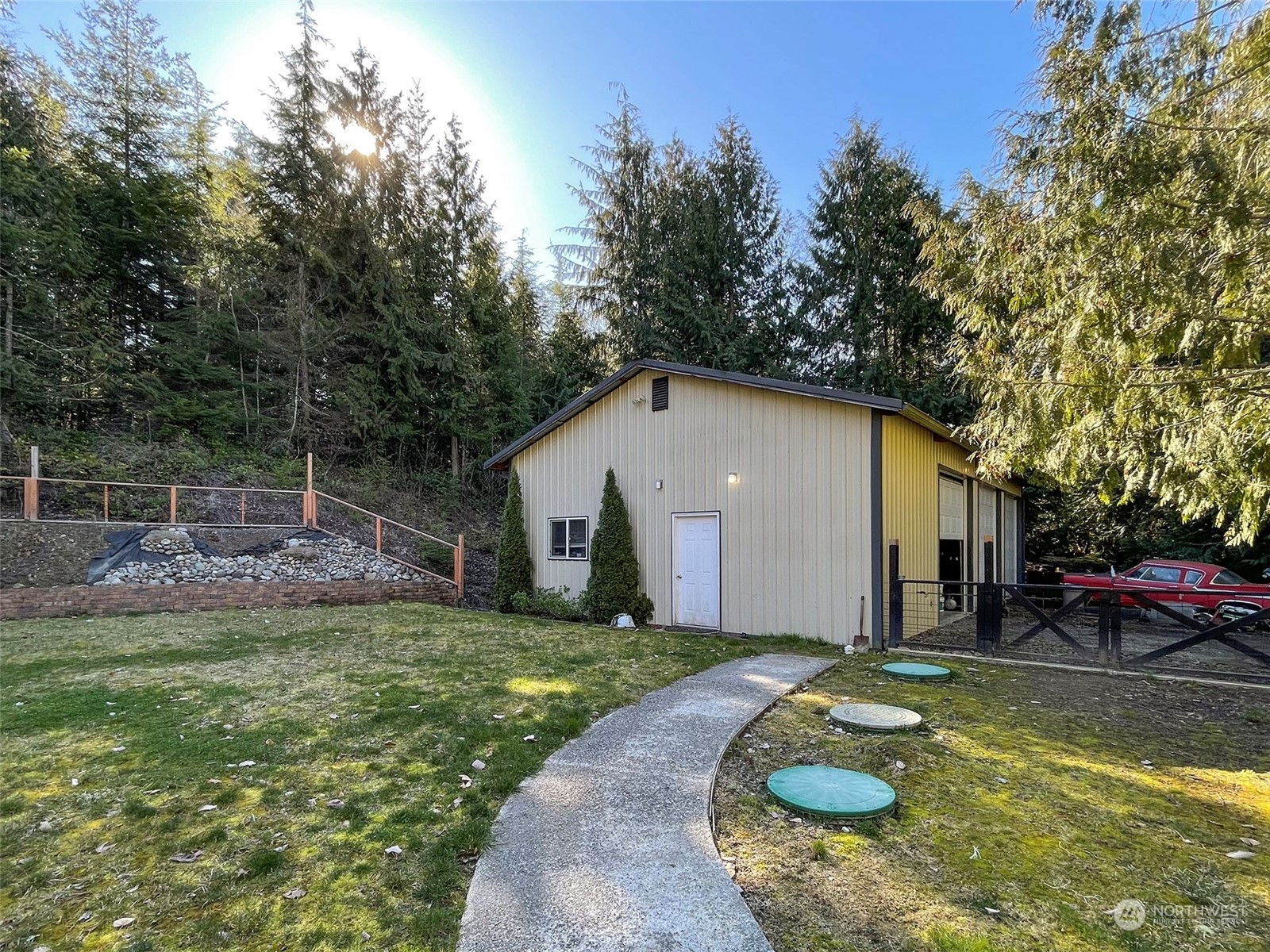297 Amarillo Road Port Angeles, WA 98362 - Photo 34 of 40 a view of a backyard with a trampoline