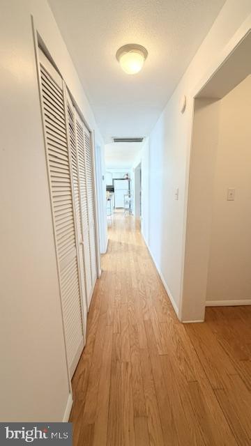 508 Lloyd Street Ocean View, DE 19970 - Photo 13 of 29 a view of a hallway with wooden floor