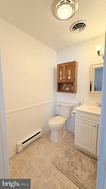 508 Lloyd Street Ocean View, DE 19970 - Photo 20 of 29 a bathroom with a toilet a sink and mirror