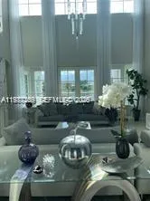 a closeup of a sink with a potted plant