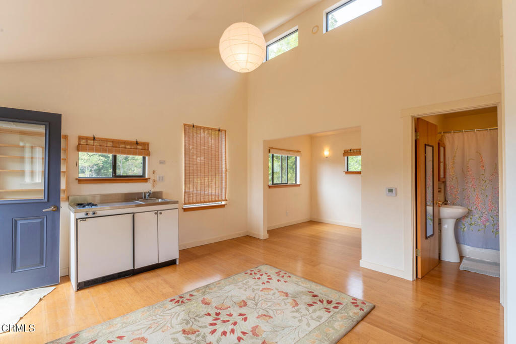 30470 Pudding Creek Road Fort Bragg, CA 95437 - Photo 23 of 34 a spacious bathroom with a granite countertop sink and a mirror