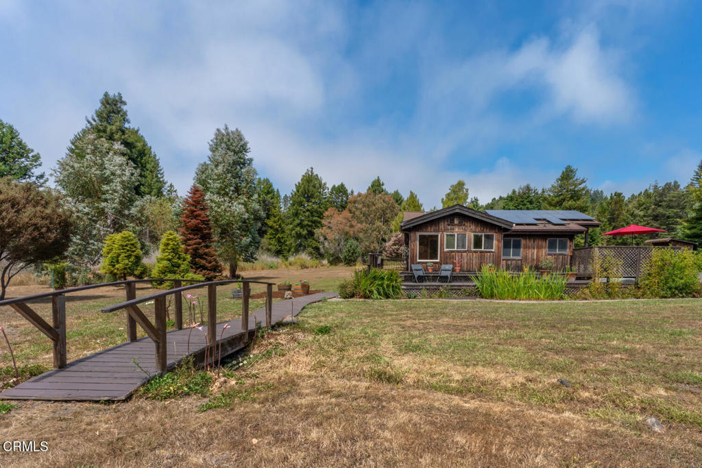 30470 Pudding Creek Road Fort Bragg, CA 95437 - Photo 29 of 34 a view of a house with wooden fence