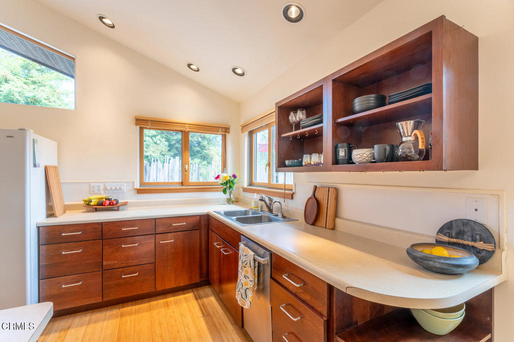 30470 Pudding Creek Road Fort Bragg, CA 95437 - Photo 6 of 34 a kitchen with a sink and a stove