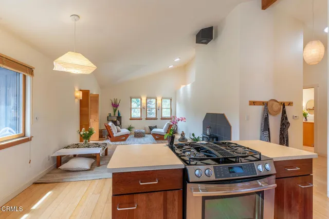 a kitchen with a stove and a sink