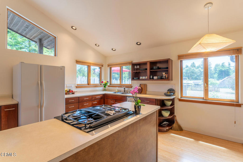 30470 Pudding Creek Road Fort Bragg, CA 95437 - Photo 10 of 34 a living room with stainless steel appliances granite countertop furniture and a window