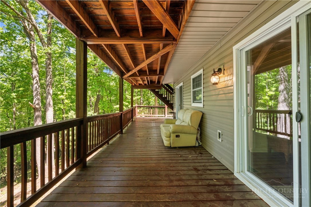 467 Horseshoe Ridge Road East Deep Gap, NC 28618 - Photo 21 of 46 a view of porch with seating space