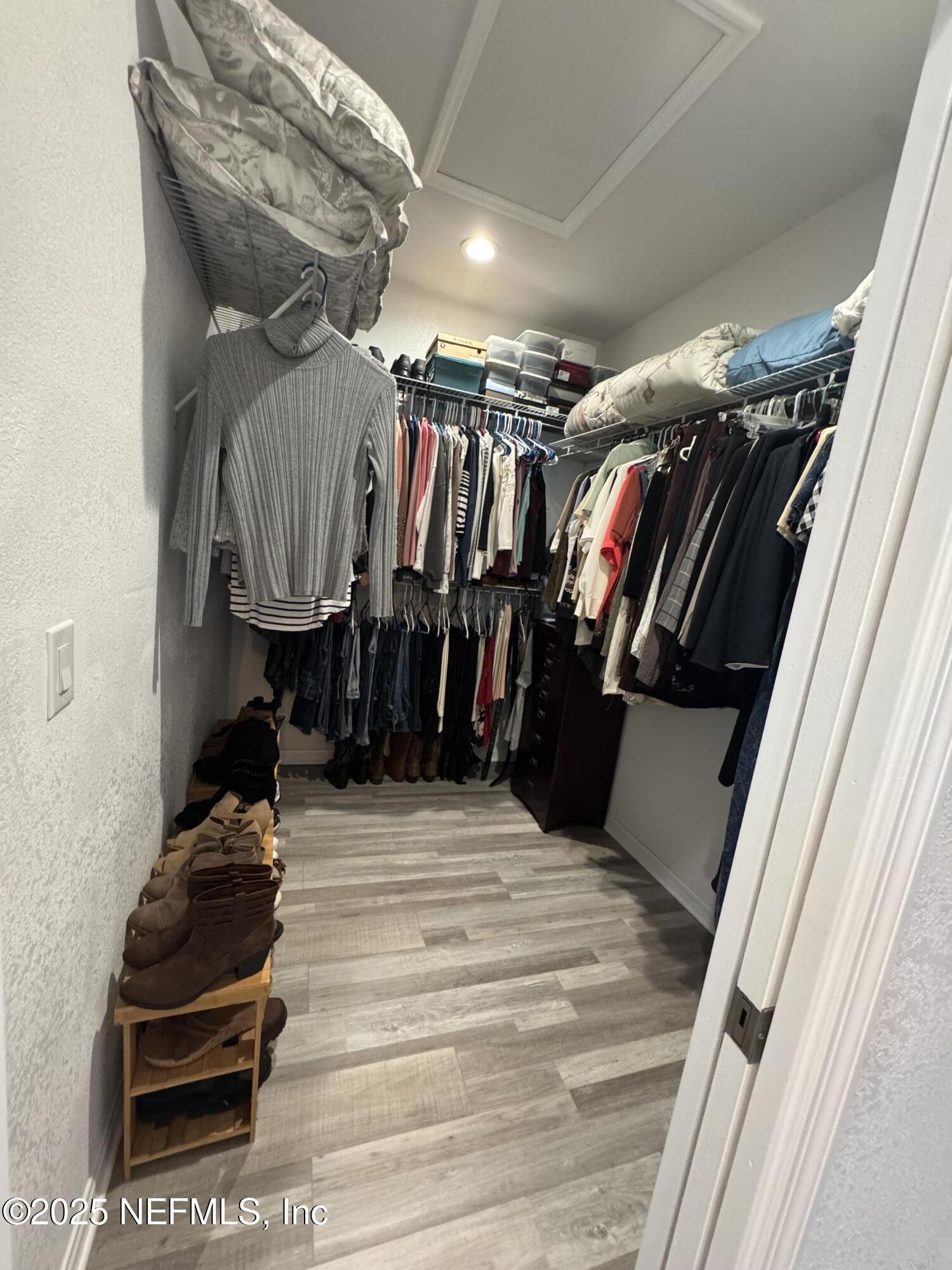 240 Ashley Street Hawthorne, FL 32640 - Photo 12 of 39 Closet #1 in Primary Bath