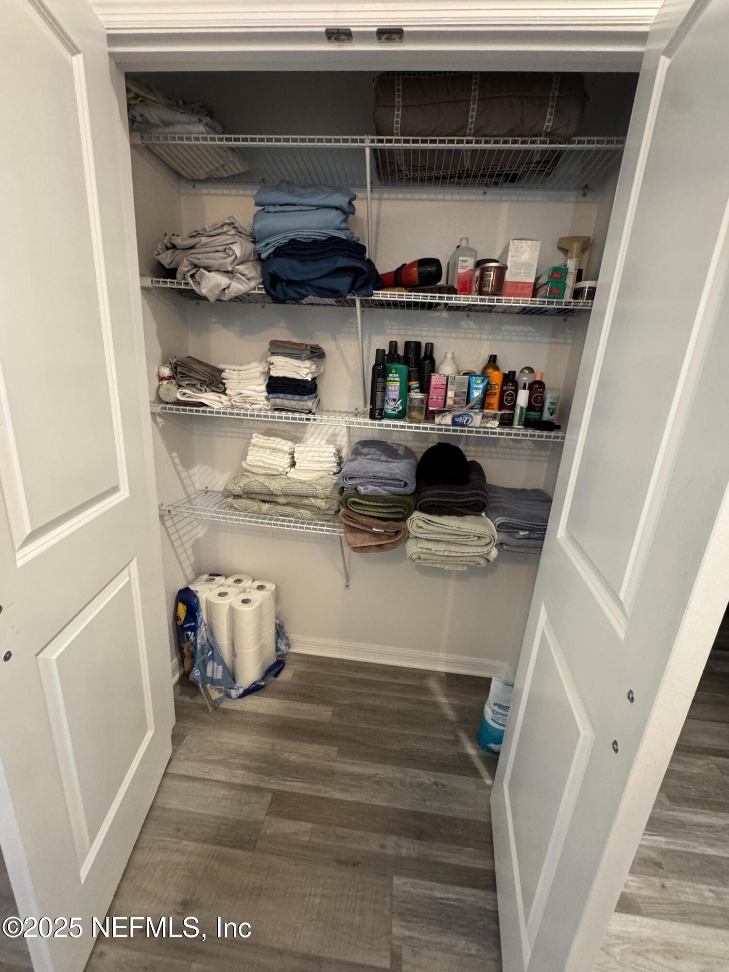 240 Ashley Street Hawthorne, FL 32640 - Photo 13 of 39 Linen closet in Primary bath