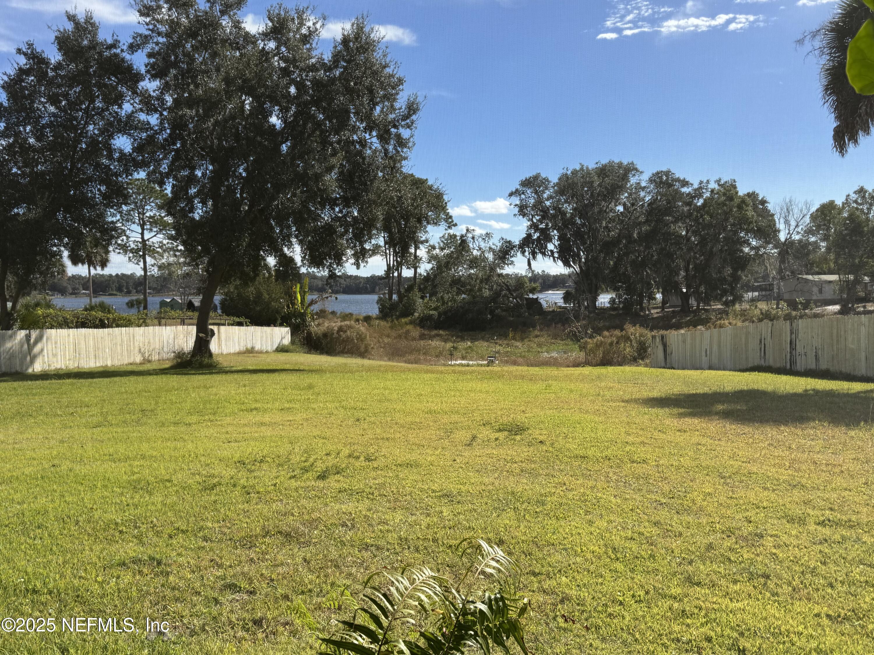 240 Ashley Street Hawthorne, FL 32640 - Photo 3 of 39 Back Yard looks on to lake