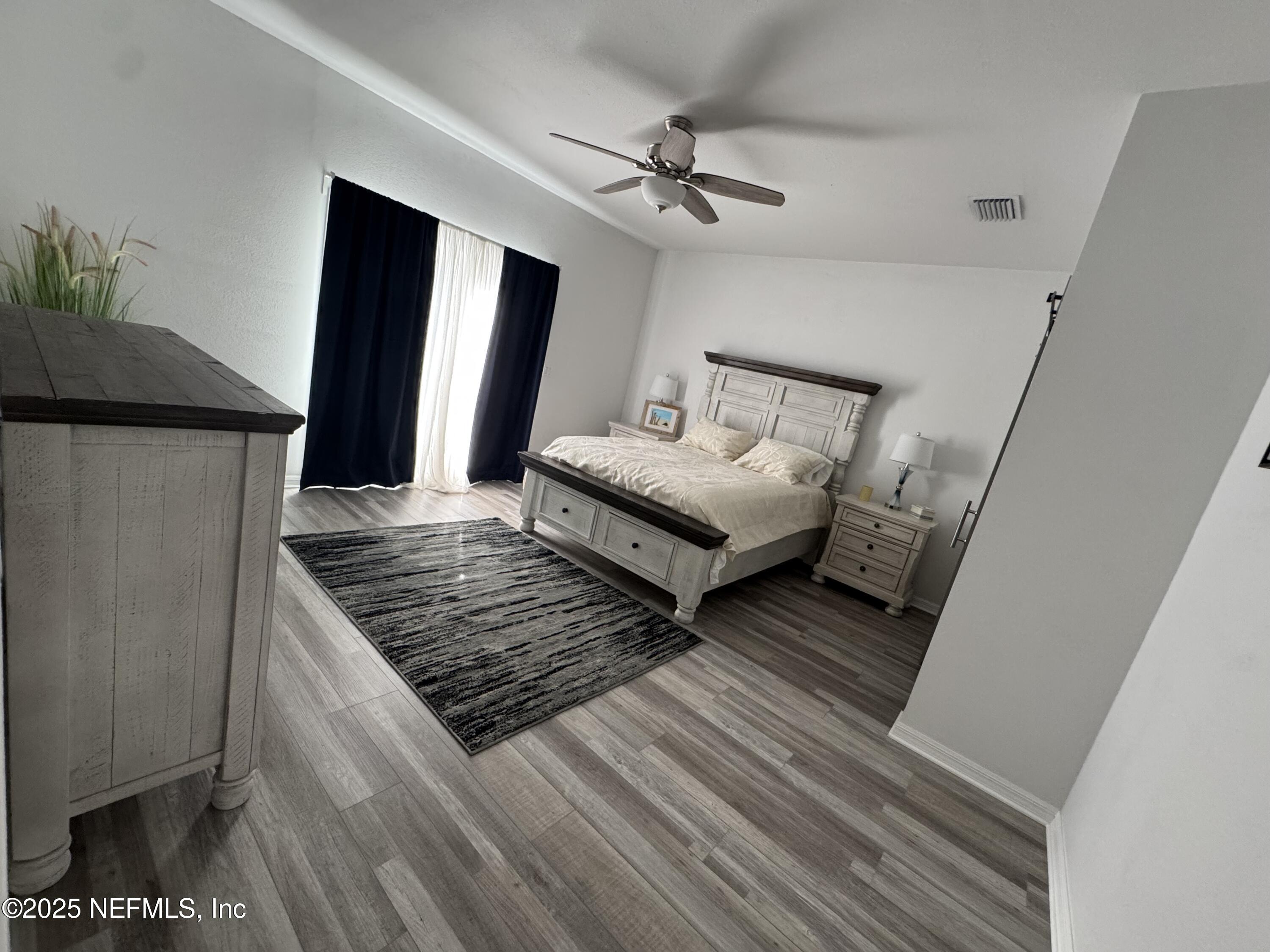 240 Ashley Street Hawthorne, FL 32640 - Photo 8 of 39 Primary BR with French doors