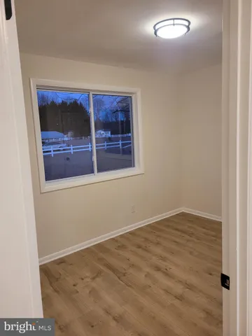an empty room with window