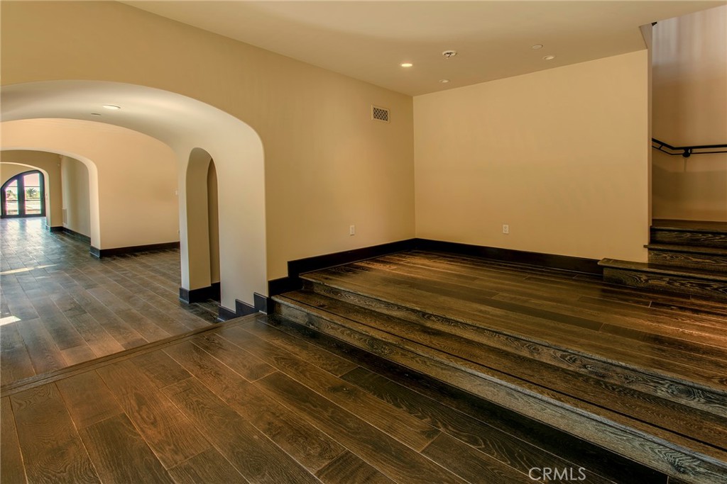 5 Currents Newport Coast, CA 92657 - Photo 13 of 36 a view of an empty room with wooden floor