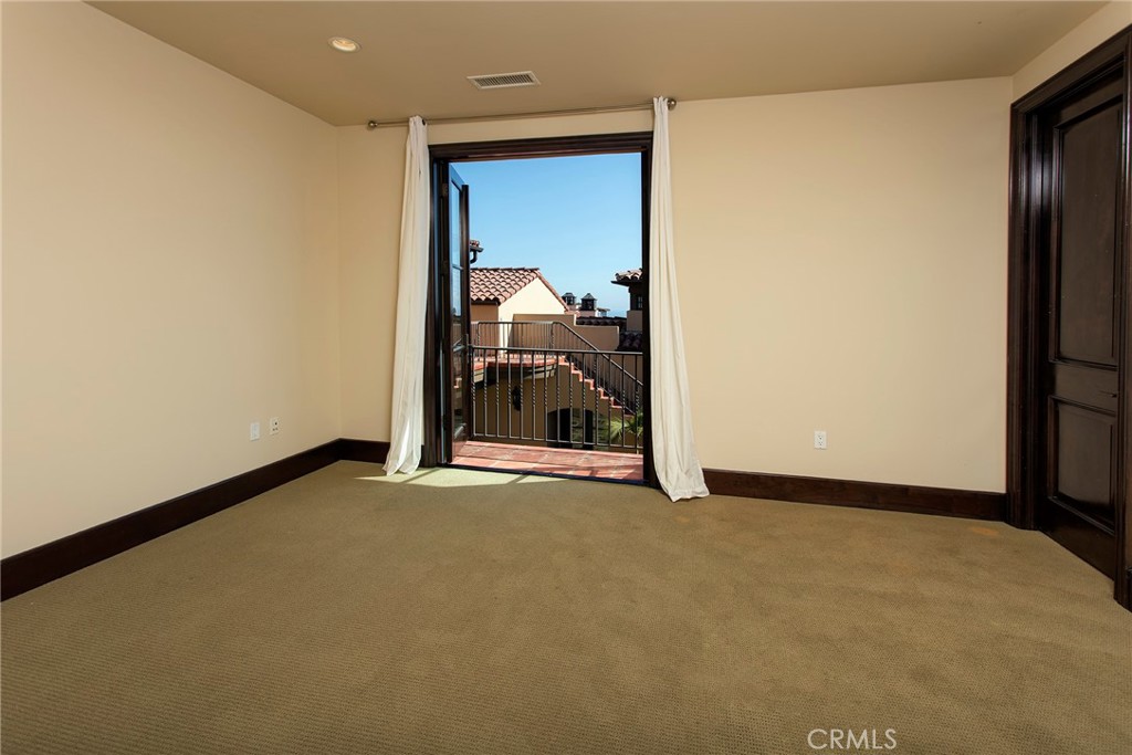 5 Currents Newport Coast, CA 92657 - Photo 22 of 36 a view of a room with a hallway