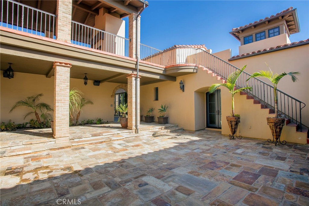 5 Currents Newport Coast, CA 92657 - Photo 26 of 36 a view of a house with a patio