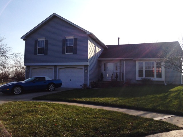 1180 Lewis Road Geneva, IL 60134 - Photo 2 of 25 a view of a house with a yard
