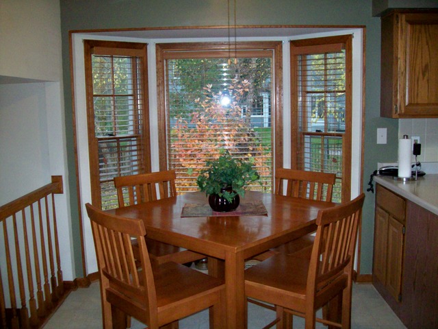 1180 Lewis Road Geneva, IL 60134 - Photo 14 of 25 a view of a dining room with furniture window and outside view