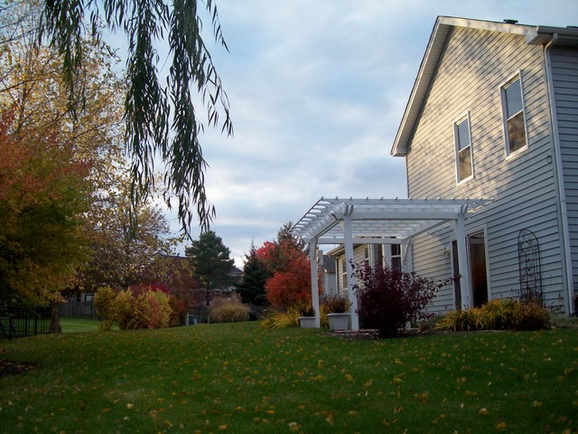 1180 Lewis Road Geneva, IL 60134 - Photo 3 of 25 a view of a house with a yard