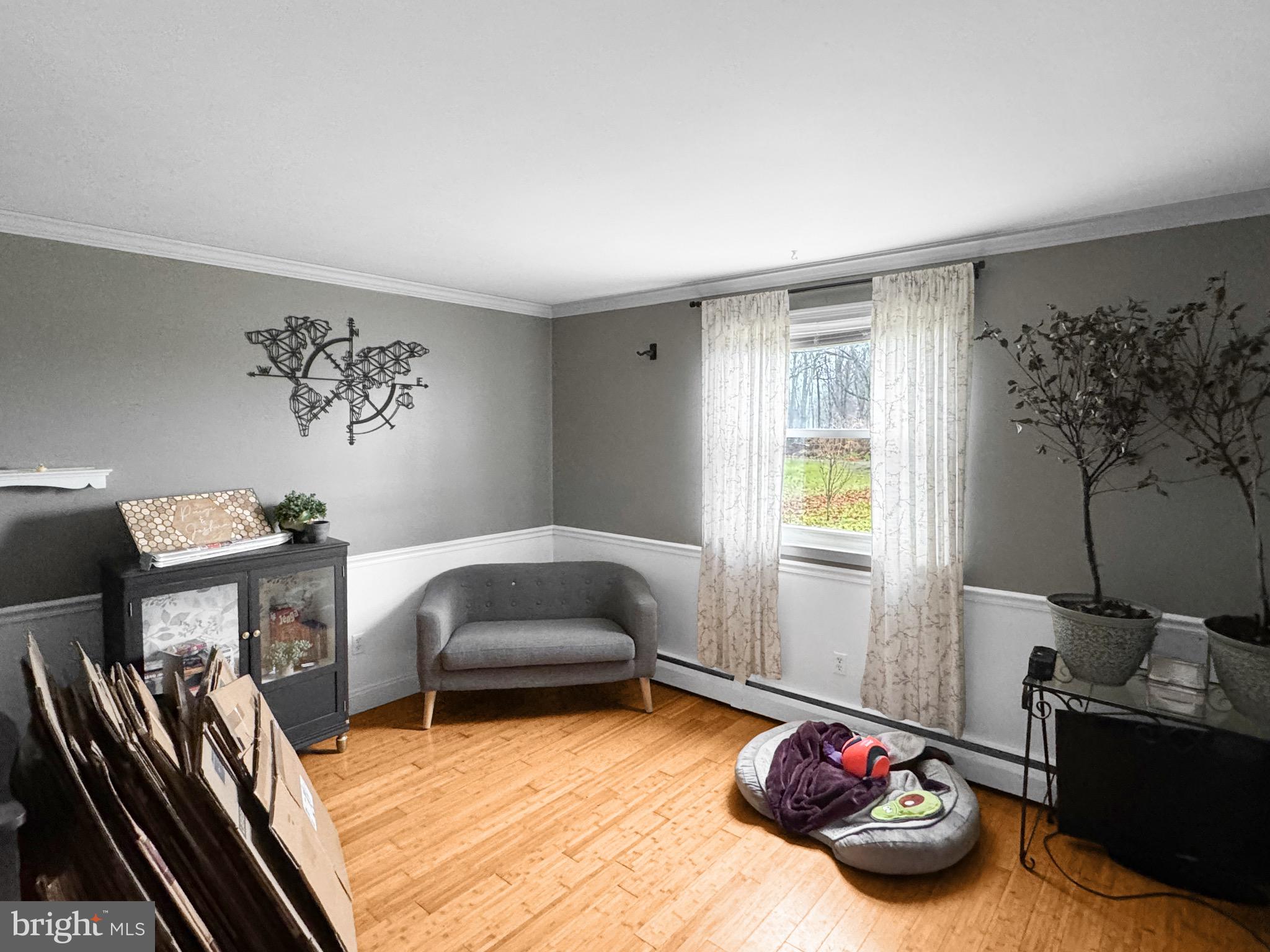 56 Gilbert Road Bordentown, NJ 08505 - Photo 9 of 16 a bedroom with furniture and a window