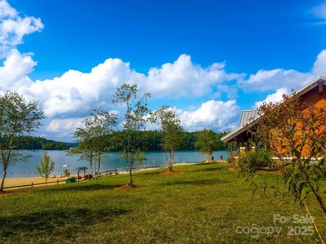 a view of a golf course with a lake view