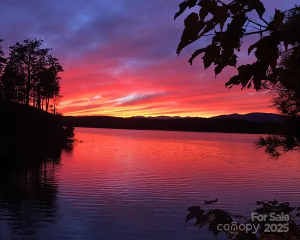 a view of lake and sunset