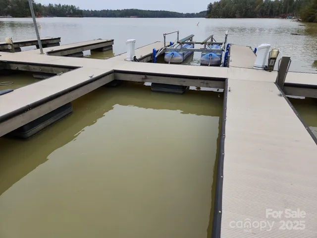 a kitchen with a refrigerator and a stove