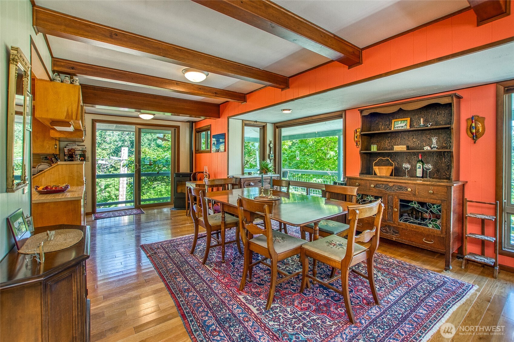 239 Killebrew Lake Road Orcas Island, WA 98280 - Photo 8 of 31 a dining room with furniture and wooden floor